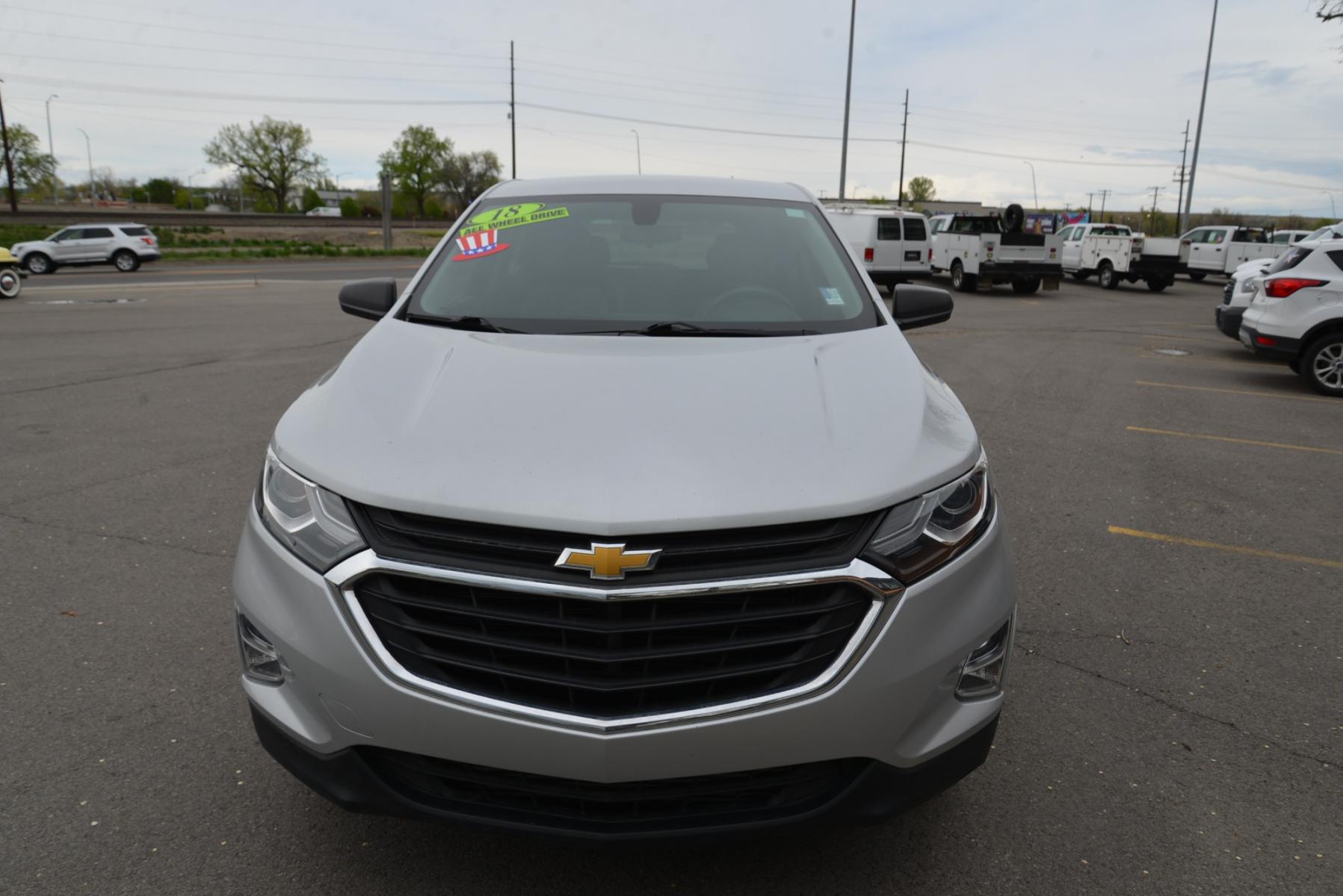 2018 Silver /Gray Chevrolet Equinox LS AWD (2GNAXREV3J6) with an 1.5L Turbo 4 cylinder engine, 6 speed automatic transmission, located at 4562 State Avenue, Billings, MT, 59101, (406) 896-9833, 45.769516, -108.526772 - 2018 Chevrolet Equinox AWD - One owner - Low miles! 1.5 Turbo 4cylinder engine - 6 speed automatic transmission - All wheel drive - LS package - 63,527 miles - One owner! LS package - air conditioning - tilt and telescoping steering wheel - cruise control - touchscreen blue tooth audio - steer - Photo #9